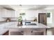 Modern kitchen featuring granite countertops, stainless steel appliances, and ample cabinetry at 932 Brian Ln, Forest Park, GA 30297