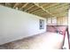 Under deck patio area with brick trim and partial lattice fence providing a secluded space for outdoor enjoyment at 932 Brian Ln, Forest Park, GA 30297