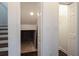 Home storage includes open stairway storage, a coat closet, and a walk-in closet with room to store your belongings at 932 Brian Ln, Forest Park, GA 30297