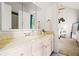 Pink bathroom vanity with granite countertops, mirror, and view into the primary bedroom at 2471 Cedar W Brk, Marietta, GA 30067