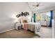 Inviting bedroom boasting a vaulted ceiling, a ceiling fan, and large bright windows at 2471 Cedar W Brk, Marietta, GA 30067
