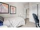 Cozy bedroom featuring a white metal bed frame, abstract art, and closet at 2471 Cedar W Brk, Marietta, GA 30067