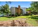 Beautifully landscaped property featuring lush green grass and mature trees providing ample shade and privacy at 2471 Cedar W Brk, Marietta, GA 30067
