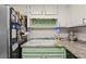 Traditional kitchen showcasing white cabinets, custom backsplash, modern appliances, and marble countertops at 2471 Cedar W Brk, Marietta, GA 30067