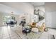Spacious living area with comfortable seating, dining space, and a spiral staircase leading to the upper level at 2471 Cedar W Brk, Marietta, GA 30067