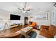 Open concept living room and dining area with hardwood floors and modern furnishings at 411 10Th Ne St # 6, Atlanta, GA 30309