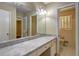 Bathroom vanity with a mirror and access to toilet and shower area at 5739 Cobb Mdw, Norcross, GA 30093