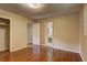Bedroom with hardwood floors, closet, and en-suite bathroom at 5739 Cobb Mdw, Norcross, GA 30093