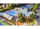 Aerial view of the community's amenities, including the pool, clubhouse, and tennis courts at 450 Hunt Creek Dr, Acworth, GA 30101