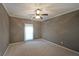 Spacious bedroom features carpet, natural light, and neutral color palette, creating a relaxing retreat at 450 Hunt Creek Dr, Acworth, GA 30101