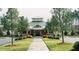 Charming clubhouse with a beautiful front entrance and well-manicured lawn and landscaping at 450 Hunt Creek Dr, Acworth, GA 30101