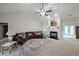 Bright living room with a fireplace, large sectional sofa, and French doors at 450 Hunt Creek Dr, Acworth, GA 30101