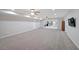Spacious open-concept living area with recessed lighting and carpet, perfect for entertaining guests at 450 Hunt Creek Dr, Acworth, GA 30101