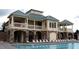 Resort-style pool with stone accented clubhouse in this community at 450 Hunt Creek Dr, Acworth, GA 30101