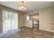 Dining area with sliding glass doors, open to the kitchen, great for everyday dining at 5026 Brittany Dr, Stone Mountain, GA 30083