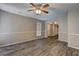 Inviting living room with wood-look flooring offers a versatile space for relaxation and entertainment at 5026 Brittany Dr, Stone Mountain, GA 30083