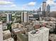 Wide aerial shot of the cityscape, showcasing the building's position within the city at 57 Forsyth Nw St # 16G, Atlanta, GA 30303