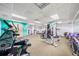 Brightly lit gym featuring weight machines, treadmills, and other exercise equipment for a complete workout experience at 57 Forsyth Nw St # 16G, Atlanta, GA 30303