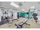 Well-equipped gym featuring modern exercise equipment, including weights, benches, and machines for strength and cardio at 57 Forsyth Nw St # 16G, Atlanta, GA 30303