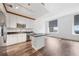 Bright kitchen features stainless steel appliances, black countertops and white cabinets at 57 Forsyth Nw St # 16G, Atlanta, GA 30303