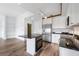 Bright kitchen features stainless steel appliances, an island cooktop and an undermount sink at 57 Forsyth Nw St # 16G, Atlanta, GA 30303
