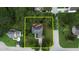 Aerial view of property and its boundaries surrounded by lush green trees and a cul-de-sac at 1248 Rockview Ct, Loganville, GA 30052