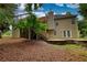 Backyard featuring a spacious yard, patio, and a deck, perfect for entertaining guests at 1248 Rockview Ct, Loganville, GA 30052