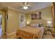 Bedroom with hardwood floors, decor, and ample natural light at 1248 Rockview Ct, Loganville, GA 30052