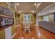 Open dining area with wood table, chairs, and hardwood floors, connecting seamlessly to the living room at 1248 Rockview Ct, Loganville, GA 30052