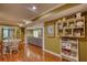 Open-concept dining area flowing into the living room with views of multiple connecting spaces at 1248 Rockview Ct, Loganville, GA 30052