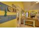 Charming living room with colorful decor, a cozy fireplace, and an adjacent bedroom view for seamless living at 1248 Rockview Ct, Loganville, GA 30052