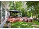 Spacious deck featuring a gazebo, seating area, and swing, ideal for outdoor entertaining at 2639 Hummingbird Nw Dr, Duluth, GA 30096