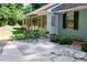 Inviting patio with stylish outdoor furniture and well-maintained landscaping at 2639 Hummingbird Nw Dr, Duluth, GA 30096