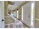 Bright foyer with updated flooring and a staircase leading to the upper level at 4512 Woodlawn Lake Dr, Marietta, GA 30068
