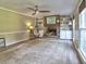 Comfortable living room features a brick fireplace and built-in shelving at 4512 Woodlawn Lake Dr, Marietta, GA 30068