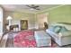 Inviting living room with a colorful rug, comfy seating, and ample natural light at 4512 Woodlawn Lake Dr, Marietta, GA 30068