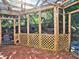 Enclosed sunroom/screened porch offers natural lighting and views of the wooded yard at 4512 Woodlawn Lake Dr, Marietta, GA 30068