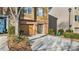 Charming two-story townhome with neutral siding, attached garage, and well-manicured landscaping at 2793 Keystone Ave, Lithonia, GA 30058