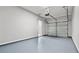 Clean and spacious two car garage with painted floor, ample lighting, and storage potential at 2793 Keystone Ave, Lithonia, GA 30058