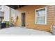 Cozy outdoor patio featuring neutral siding, an entry door, and a spacious area for relaxing at 2793 Keystone Ave, Lithonia, GA 30058