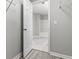 Walk-in closet with a view to the bathroom, perfect for organization and storage at 2793 Keystone Ave, Lithonia, GA 30058