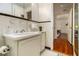 Bathroom with white cabinets, white tiling, and black accent trim at 425 Lindbergh Ne Dr # A2, Atlanta, GA 30305
