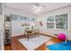 Bright bedroom with hardwood floors, a ceiling fan and modern decor at 425 Lindbergh Ne Dr # A2, Atlanta, GA 30305