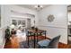 Bright dining room adjacent to living room features hardwood floors and modern lighting at 425 Lindbergh Ne Dr # A2, Atlanta, GA 30305