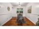 Bright dining room features hardwood floors, modern lighting and elegant decor at 425 Lindbergh Ne Dr # A2, Atlanta, GA 30305