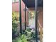 Charming front entrance of a brick home with potted plants and greenery creating a welcoming and inviting space at 425 Lindbergh Ne Dr # A2, Atlanta, GA 30305