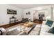 Bright living room features hardwood floors, a large rug, and stylish furniture at 425 Lindbergh Ne Dr # A2, Atlanta, GA 30305