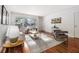 Cozy living room with hardwood floors, bright light, neutral colors, and updated decor at 425 Lindbergh Ne Dr # A2, Atlanta, GA 30305