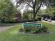 Exterior view of 425 Lindbergh Drive sign with manicured lawn and apartment building in the background at 425 Lindbergh Ne Dr # A2, Atlanta, GA 30305
