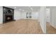 Finished basement with fireplace, hardwood floors and walkout to patio at 9165 Eves Cir, Roswell, GA 30076